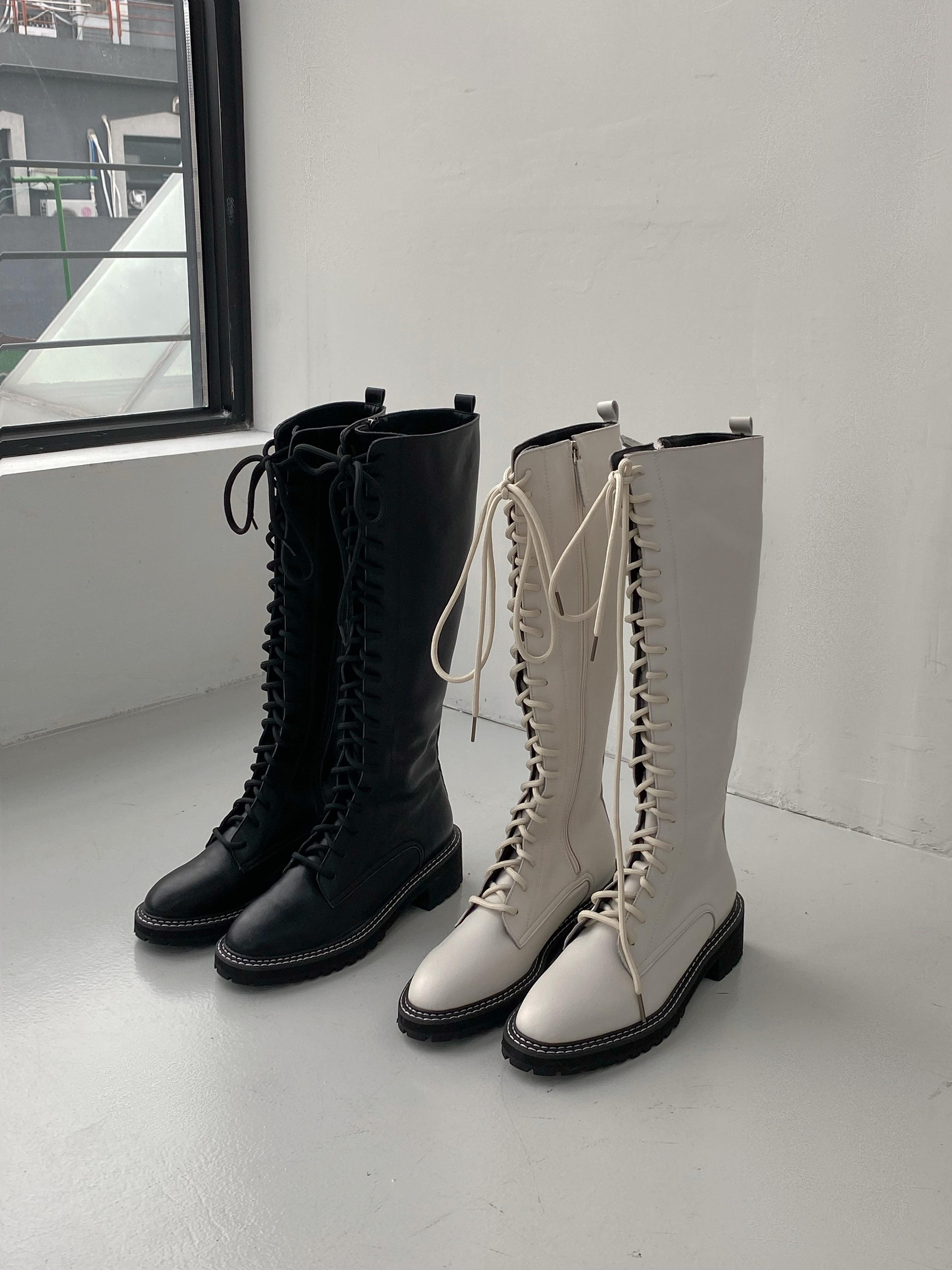 stitch lace-up boots